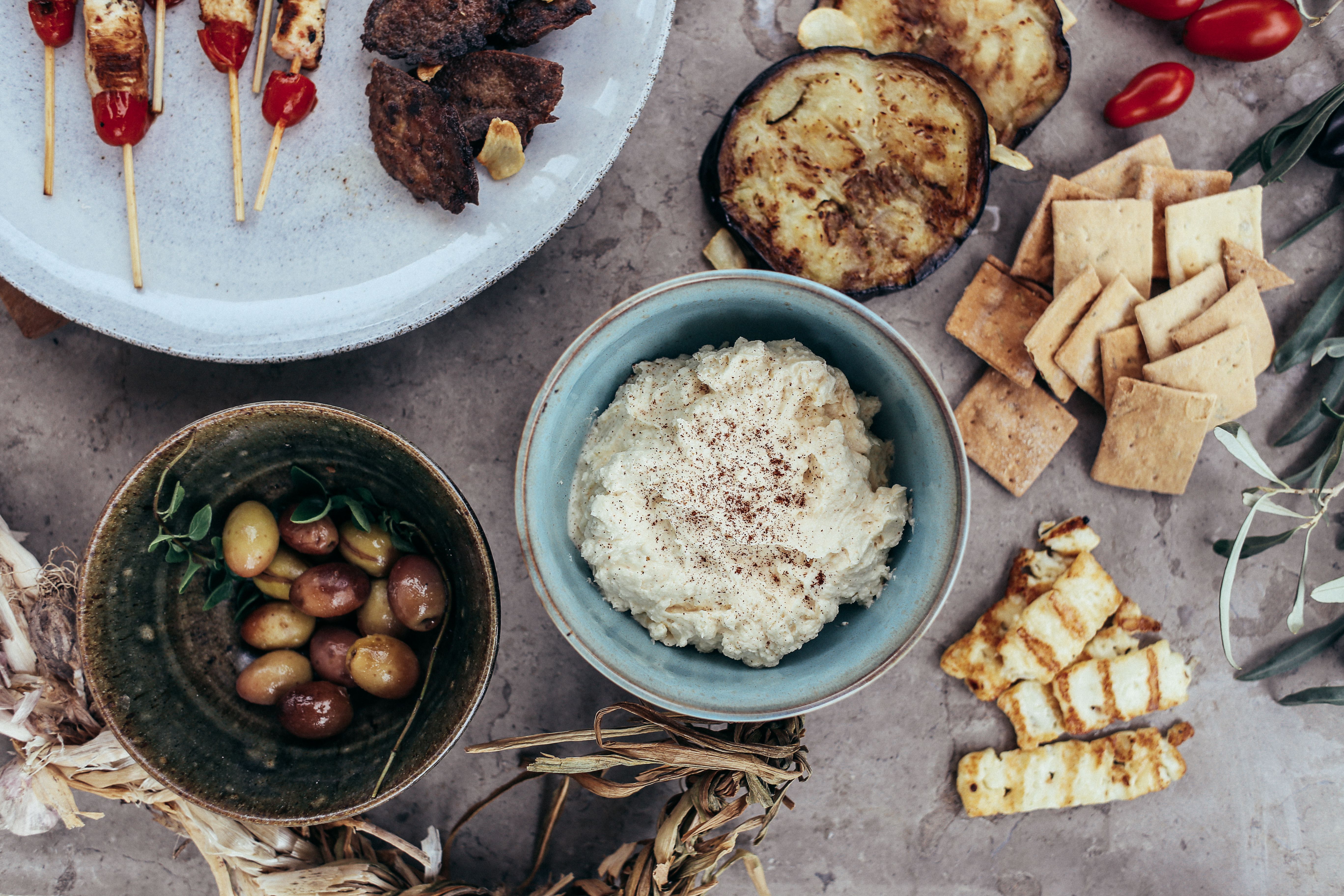 Mediterranean-style mezze snacks laid out on a table