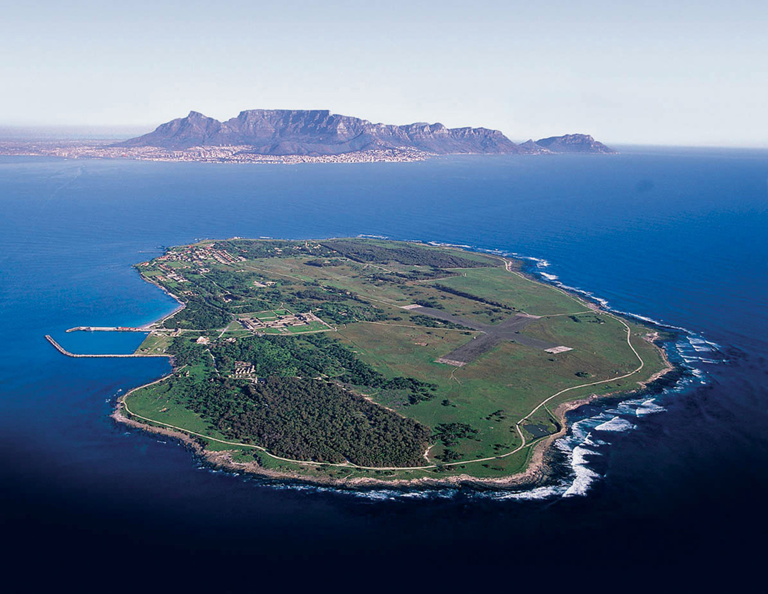 Aerial view of Robben Island with Table Mountain visible in the background