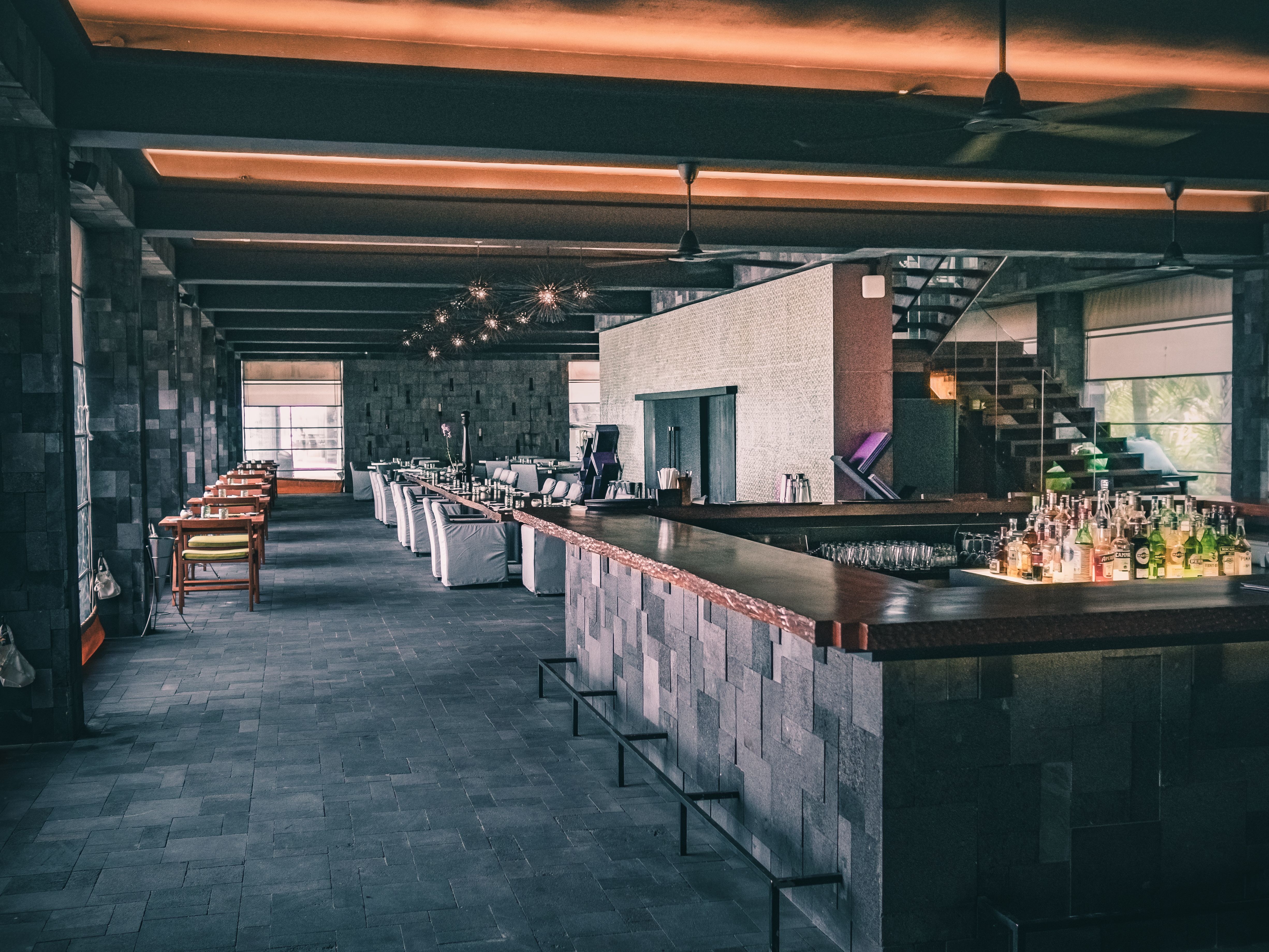 Modern restaurant interior in dark tones